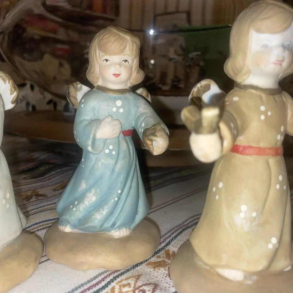 4 Distressed Young Angels In Different Poses And‎ Colors Of Dress, Very Sweet